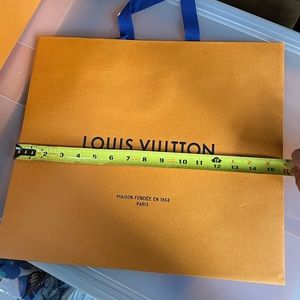 Louis Vuitton shopping bags.